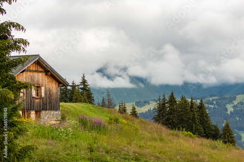 An isolated chalet in the Alps, near Morzine, in France, the mountain in spring.