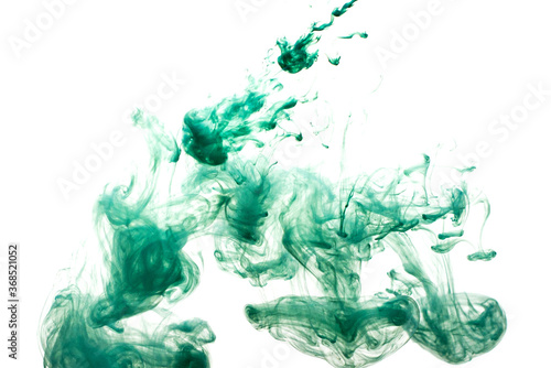 A cloud of green paint released into clear water. Isolate on a white background.