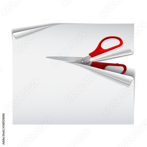 Scissors with red plastic handles cutting white paper sheet