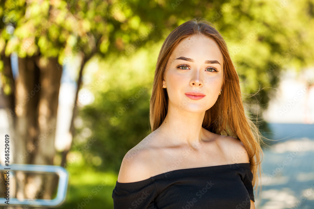 Close up portrait of a young beautiful girl in summer park Close up portrait of a young beautiful girl in summer park