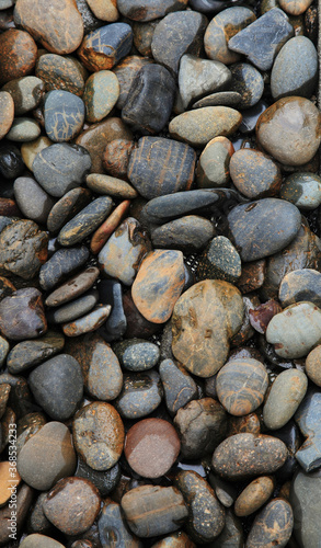 Abstract colorful pebbles texture for background and backdrop. Garden paths decorated with gravel.