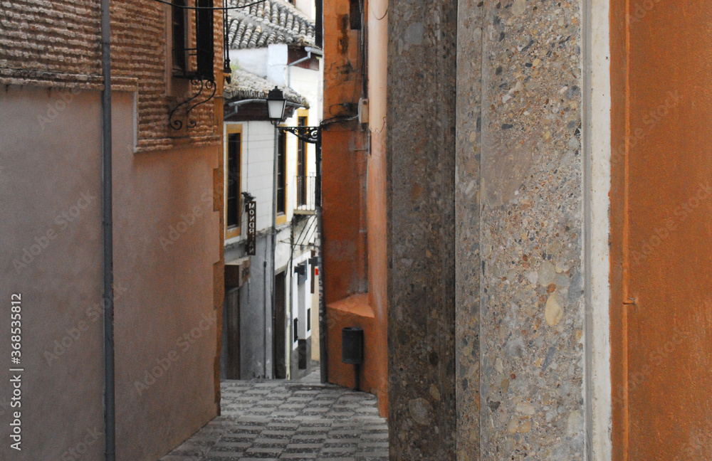 Fototapeta premium Spain- Granada- A Narrow Passageway Through Old Town