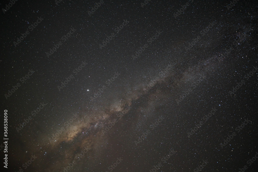 Fototapeta premium Okinawa,Japan-July 20, 2020: The milky way observed at Miyakojima island, Okinawa, Japan, at midnight in the summer 