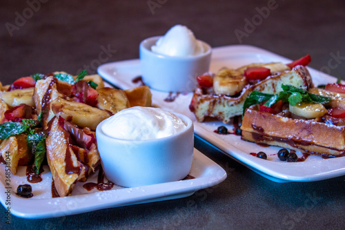 Delicious food on a grey table