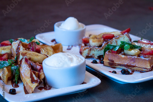 Delicious food on a grey table