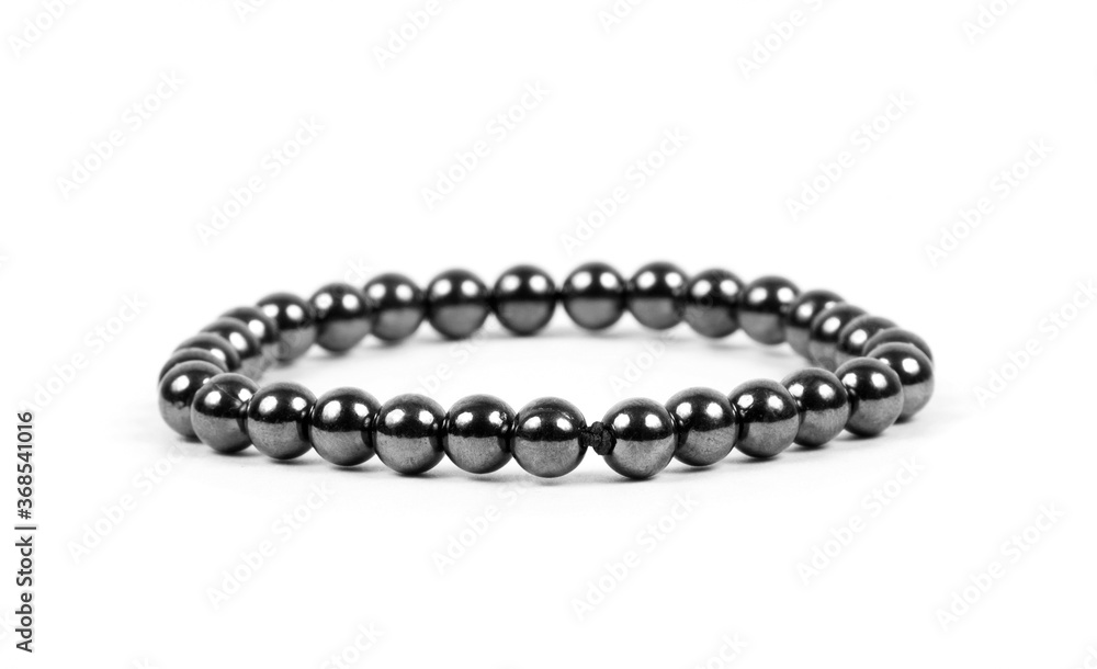 Beaded bracelet on the white surface Beaded bracelet on the white surface
