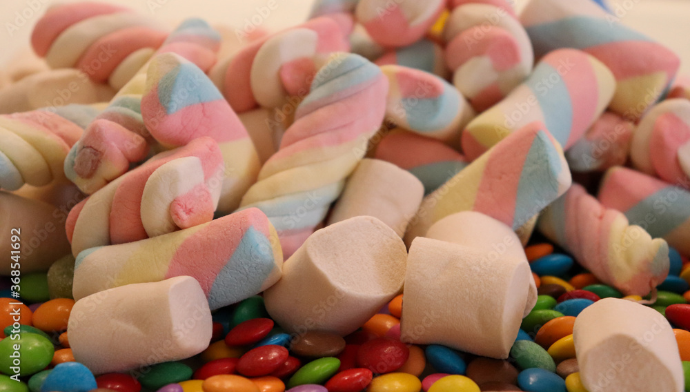 Different sweets decorating a beautiful party table. Different sweets decorating a beautiful party table.