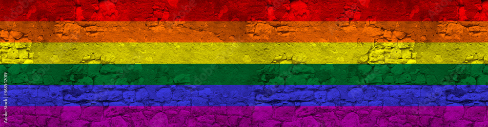 seamless panorama of LGBT rainbow flag on an old stone wall with cracks, the concept of historical, tourism, emigration, economy, politics, global world trade seamless panorama of LGBT rainbow flag on an old stone wall with cracks, the concept of historical, tourism, emigration, economy, politics, global world trade