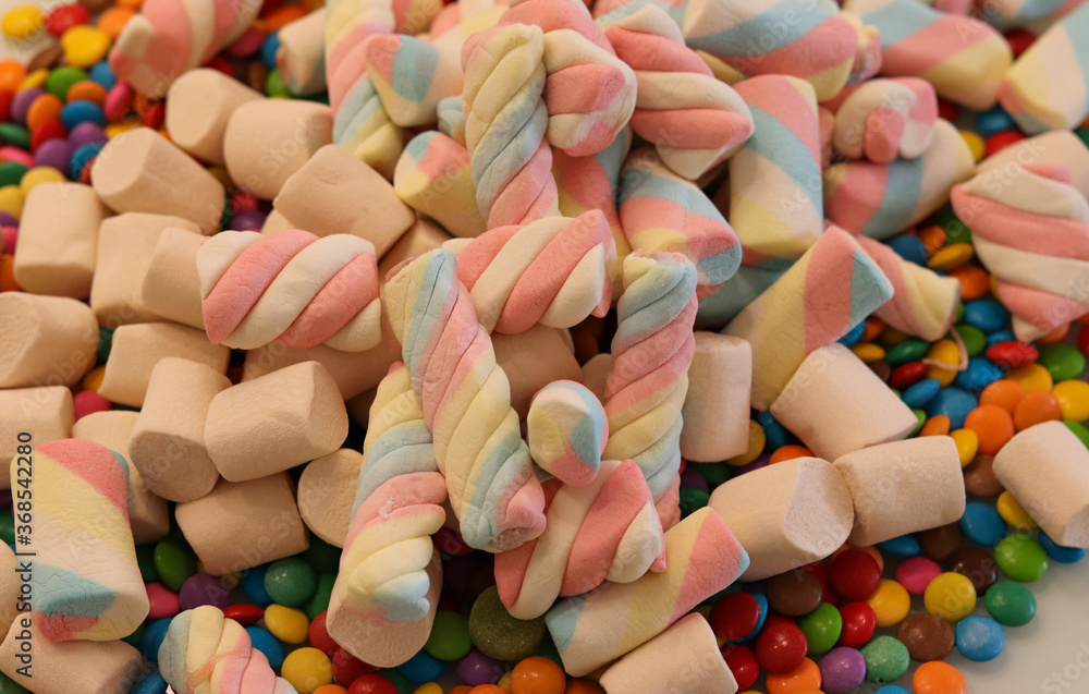 Different sweets decorating a beautiful party table. Different sweets decorating a beautiful party table.