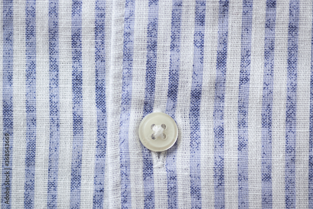 Close up of men's striped shirt. Close up of men's striped shirt.
