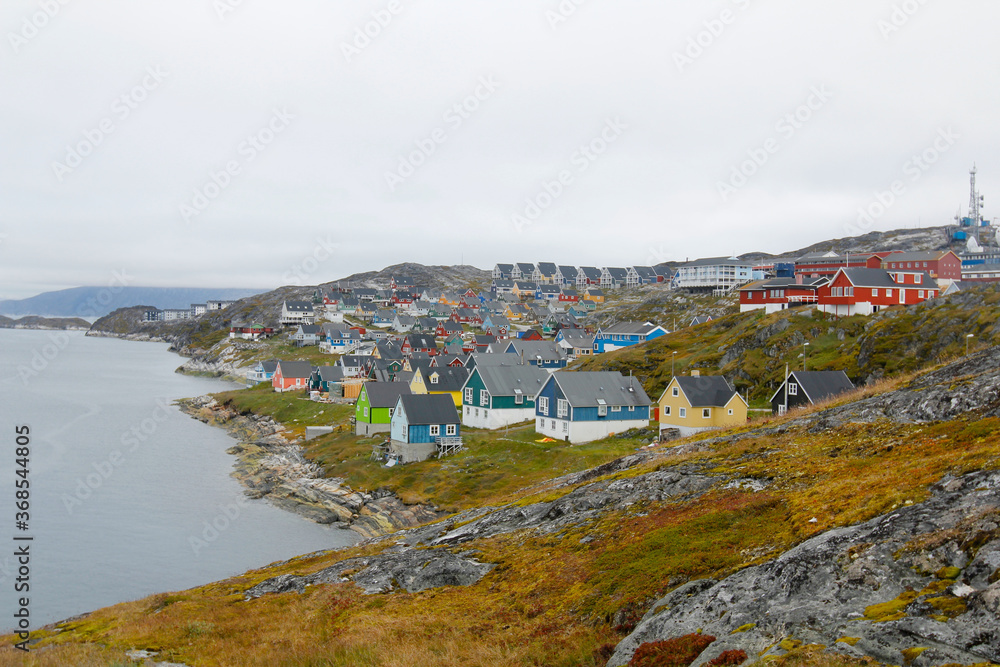 The grey skies and colorful housing of Nuuk, capital city of Greenland