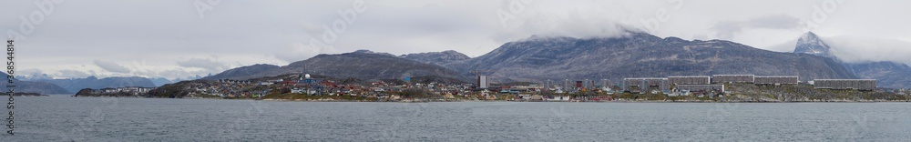 The grey skies and colorful housing of Nuuk, capital city of Greenland