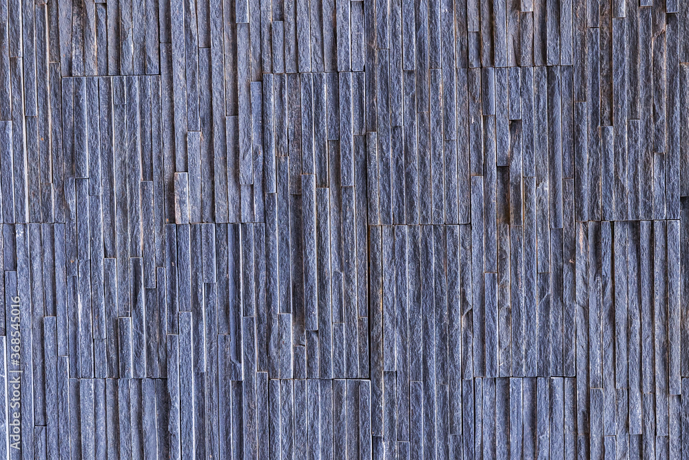 purple gray slate stone background, ribbed and uneven weathered pattern purple gray slate stone background, ribbed and uneven weathered pattern