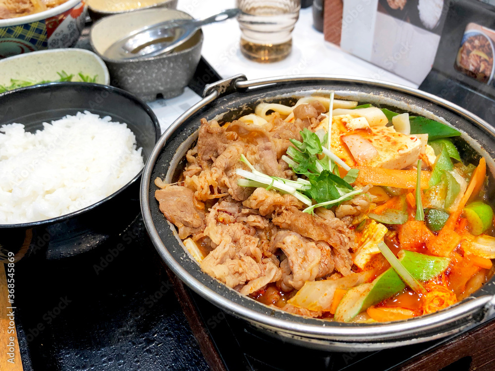 Dakbokkeumtang delicious abalone stew in a hot pot with rice