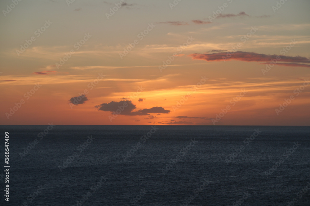 The setting sun over the Caribbean sea