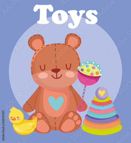 toys object for small kids to play cartoon, bear with rattle duck and pyramid