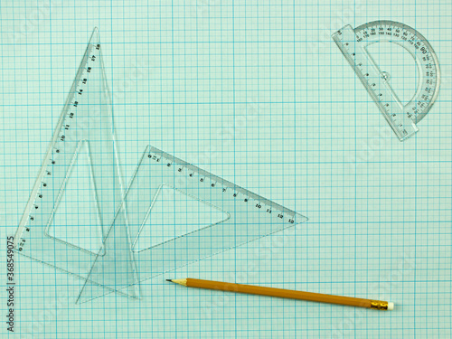 set of stationery for design and drawing. simple pencil, set of rulers and protractor. place for text
