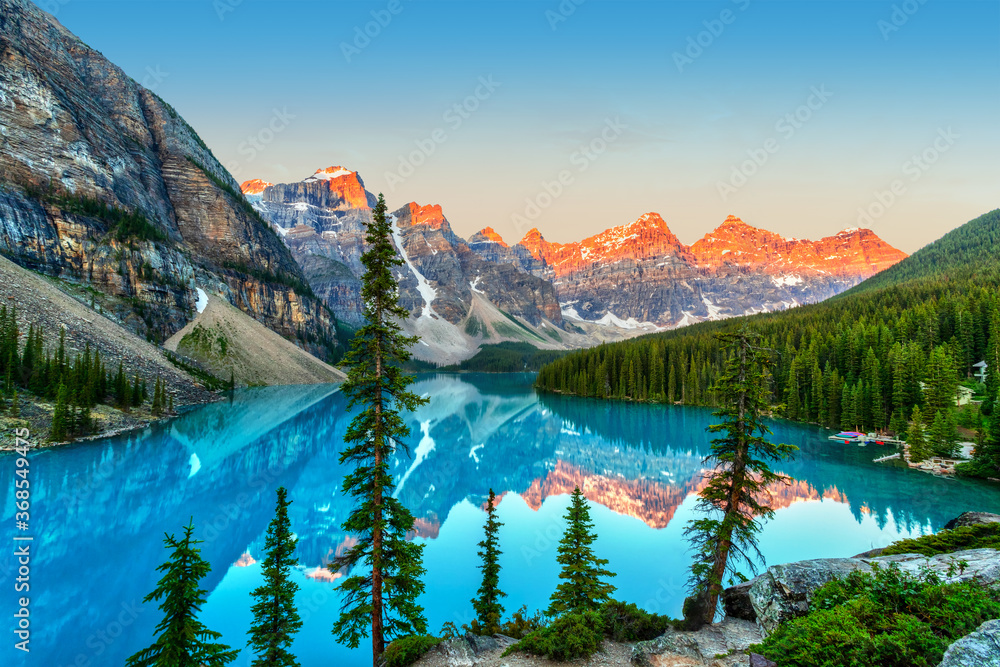 Golden Sunrise Over the Canadian Rockies at Moraine Lake in Canada