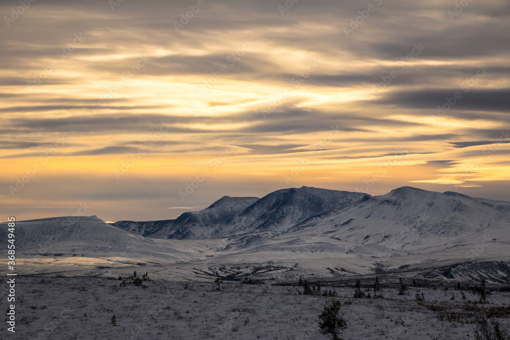 Sunset on the Tundra from the Dempster HighWay after first snow Sunset on the Tundra from the Dempster HighWay after first snow