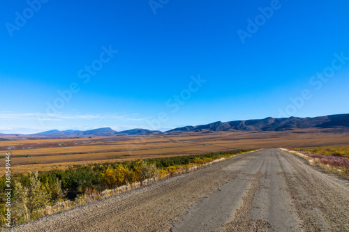 Overlanding Trip on the Dempster Highway with mountains off in the distance 