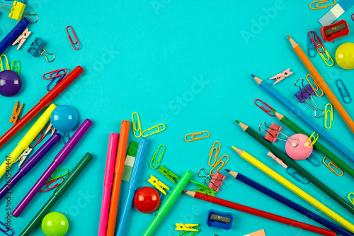 background with a set of bright colored office supplies and school supplies. knowledge day and back to school. the topic of study and education.