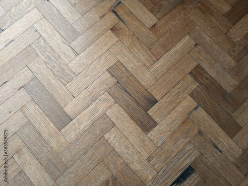 Fototapeta Naklejka Na Ścianę i Meble -  macro view of brown wooden floor of house