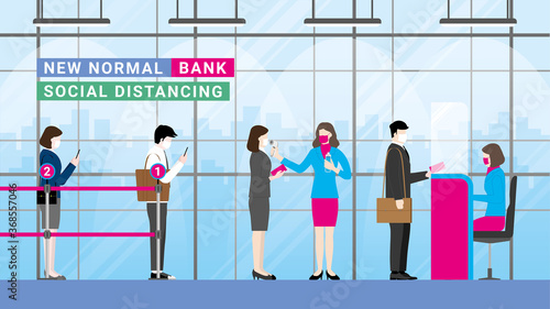 New normal lifestyle concept at the bank. People sitting apart at the queue line number. Social distancing and wearing a mask