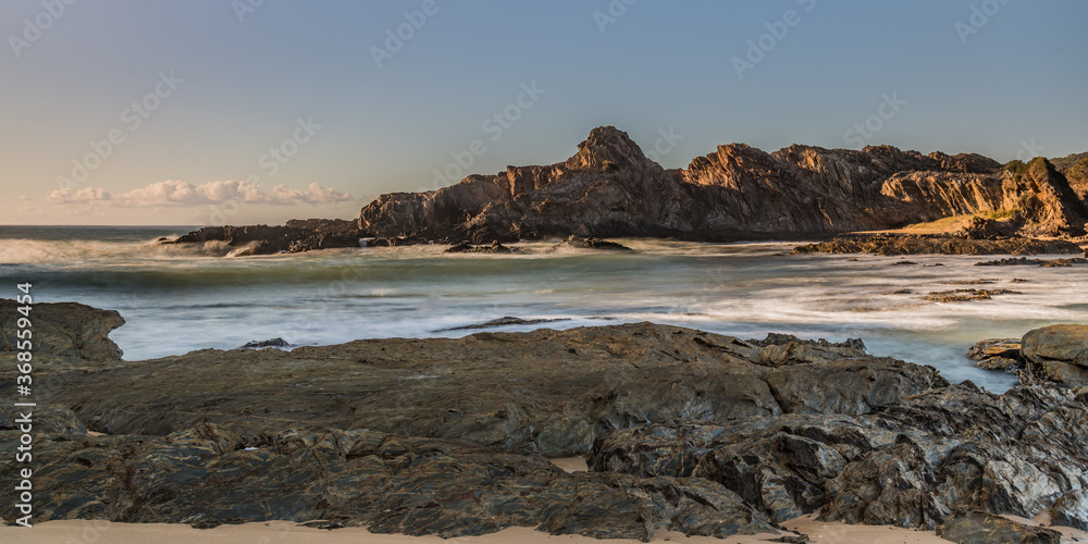 Winter at the bay - a panorama seascape with rock formations Winter at the bay - a panorama seascape with rock formations