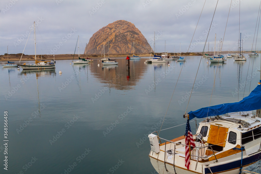 Obraz premium Sailboats Mooredi n Morro Bay With Morro Rock in The Distance, Morro Bay, California, USA