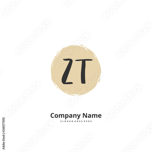 Z T ZT Initial handwriting and signature logo design with circle. Beautiful design handwritten logo for fashion, team, wedding, luxury logo. photo