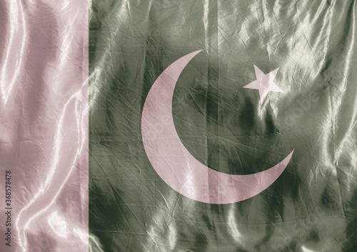 Photography State flag fluttering in the wind. Colored background on textiles