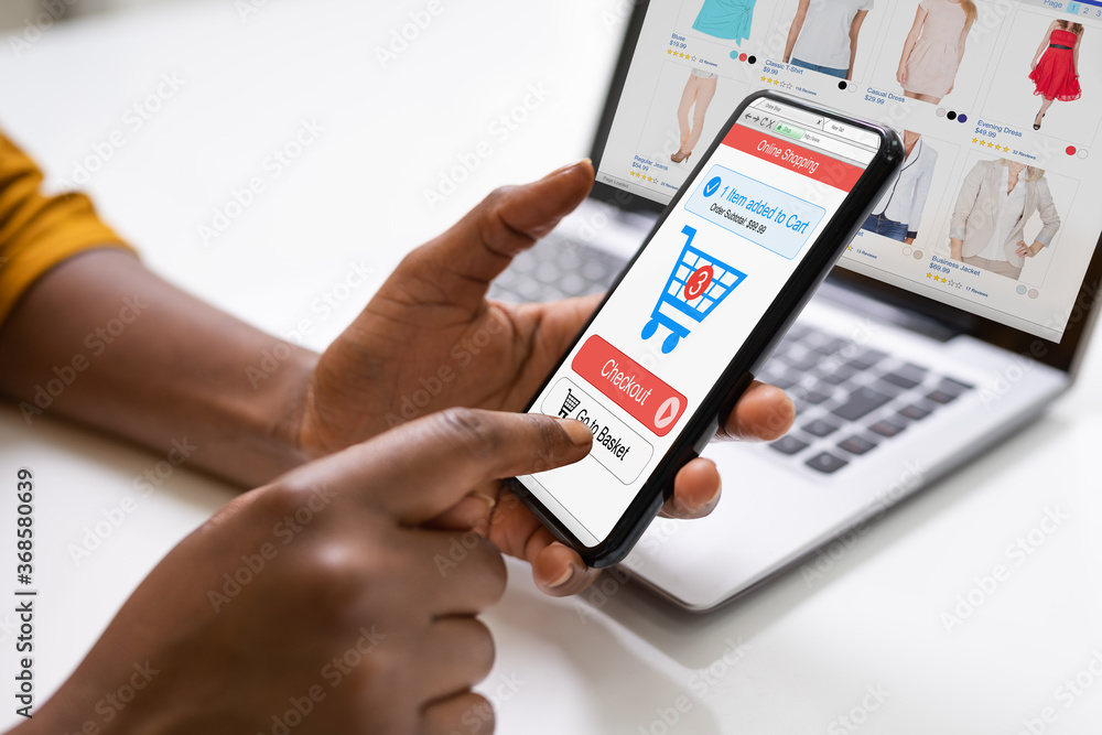 African Woman Using Online Ecommerce Shop African Woman Using Online Ecommerce Shop