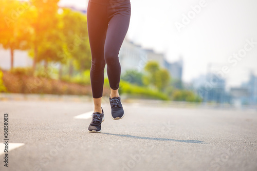 Young women run for fitness in the morning