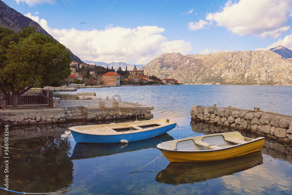 Obraz premium Beautiful winter Mediterranean landscape. Montenegro, Adriatic Sea. View of Kotor Bay and ancient Prcanj town
