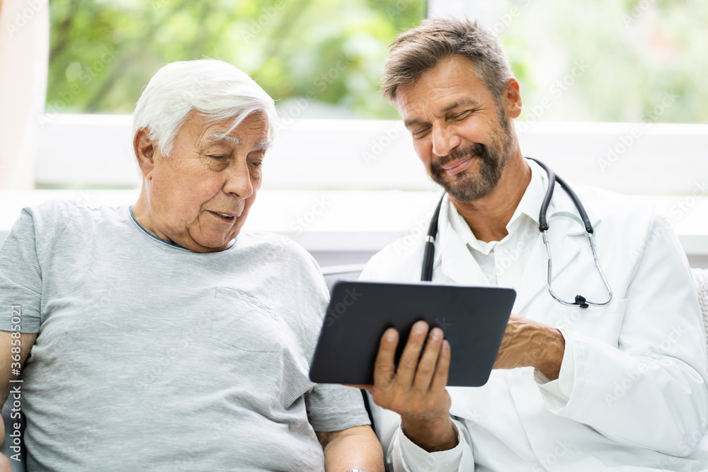 Home Care Elder Patient Looking At XRay Images Home Care Elder Patient Looking At XRay Images