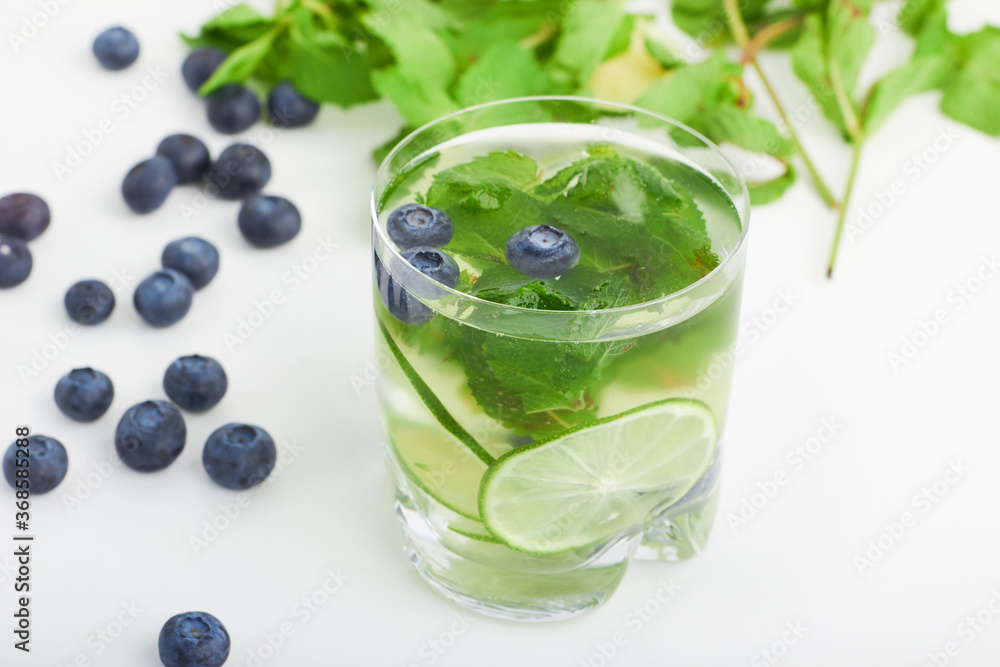 lemonade summer drink with berries and blueberries and mint with lime lemonade summer drink with berries and blueberries and mint with lime
