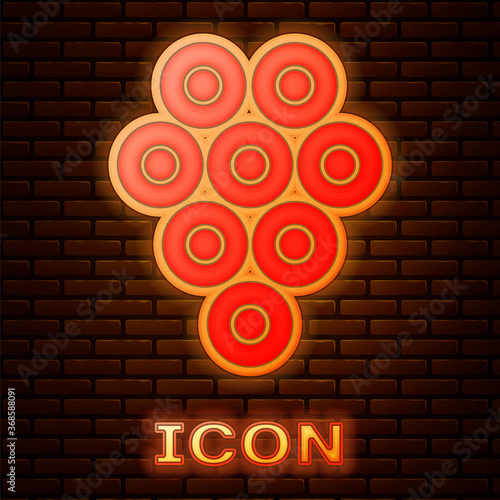 Glowing neon Caviar icon isolated on brick wall background. Vector..