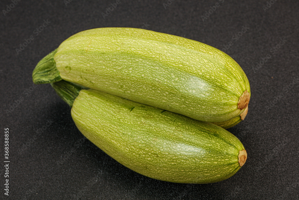 Young tasty zucchini over board Young tasty zucchini over board