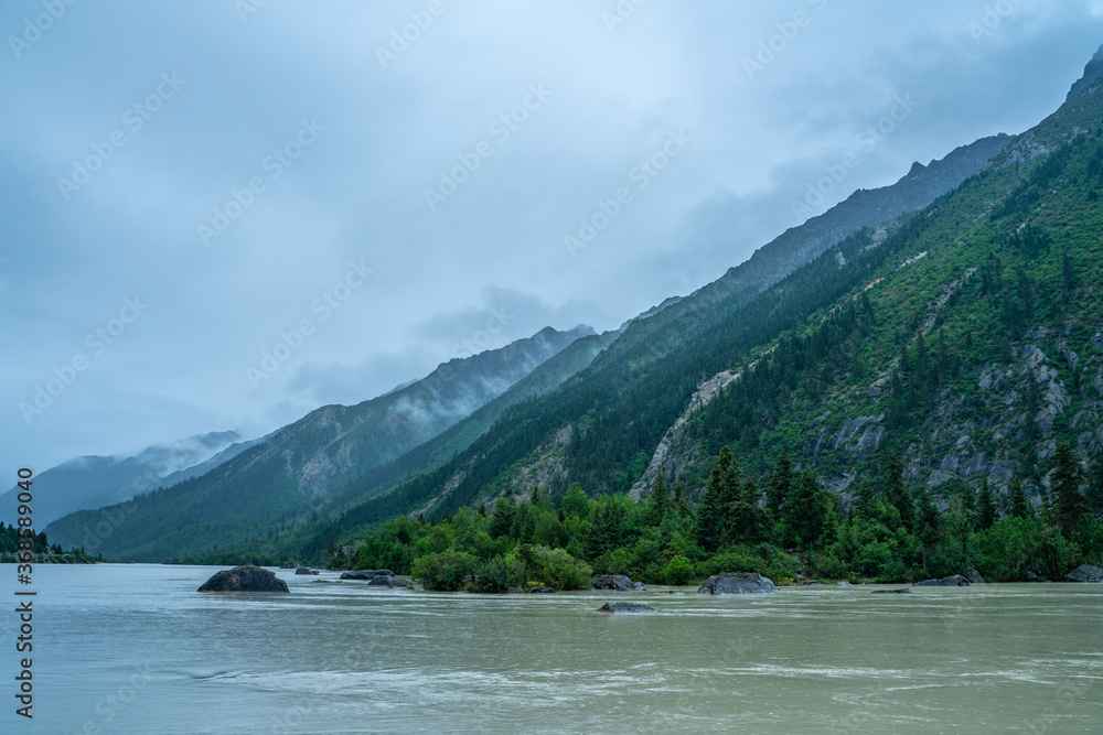 Ranwu lake, a sacred lake in Tibet, on cloudy day, summer time.