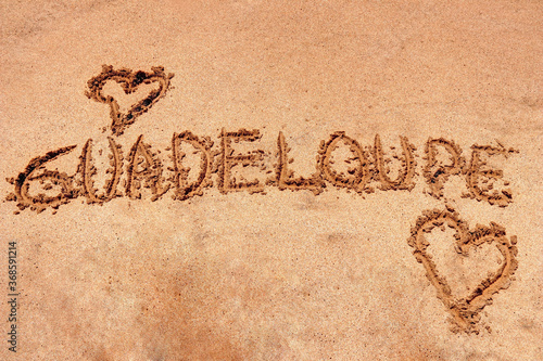 Guadeloupe écriture sur le sable des Antilles