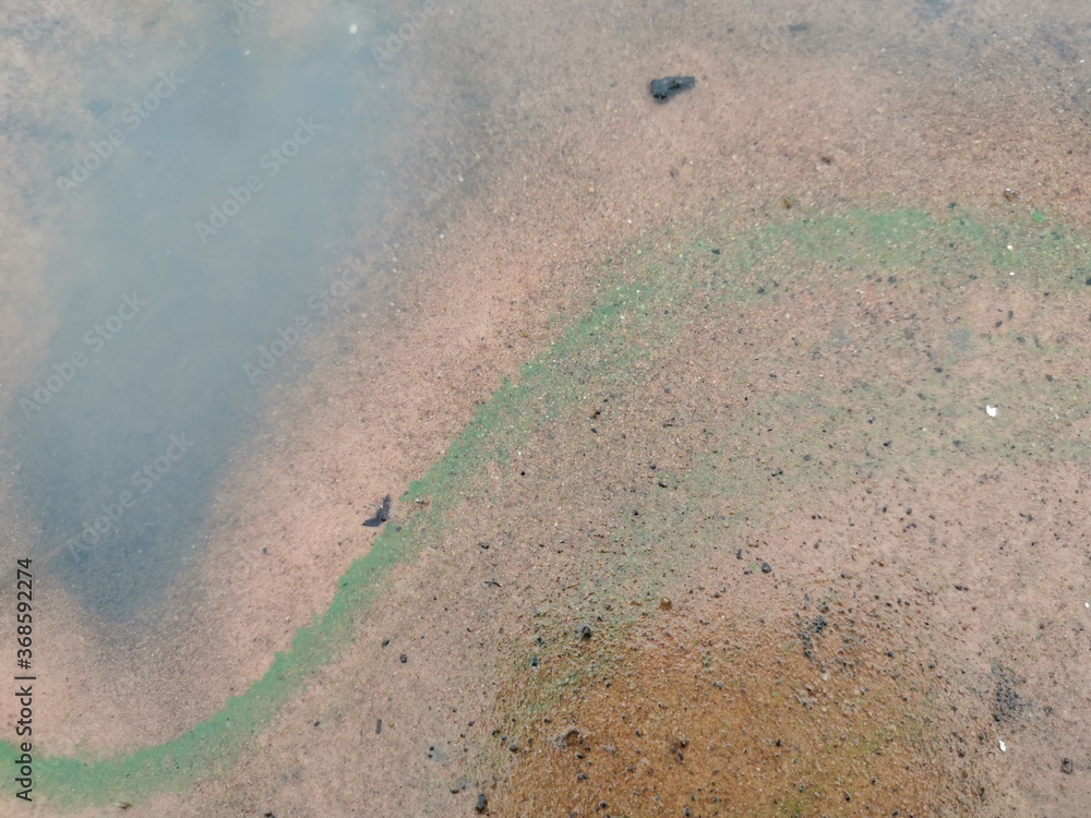 Obraz premium water drops on the beach