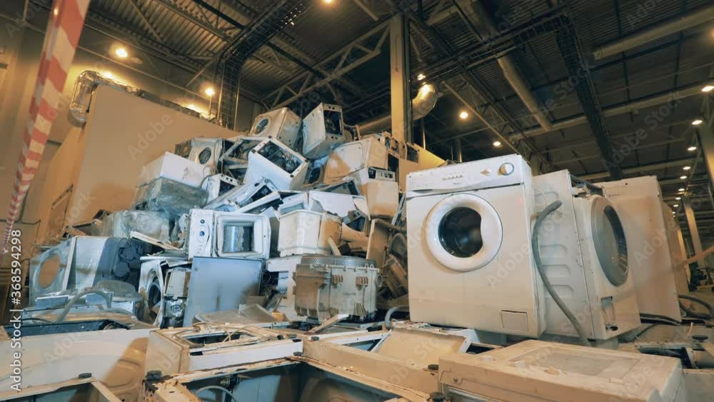 Video Stock Old washing machines piles at recycling center. Plastic