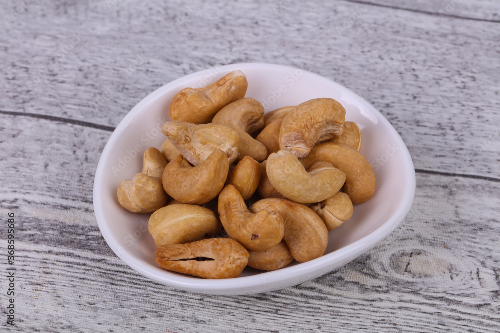 Cashew nuts heap in the bowl Cashew nuts heap in the bowl