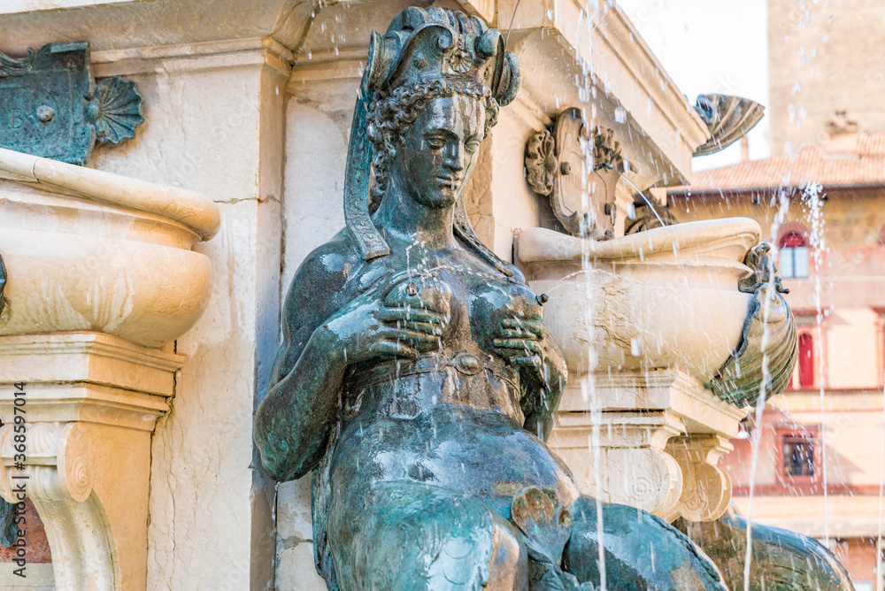 Obraz premium Fountain of Neptune (Italian: Fontana di Nettuno) located in the eponymous square, Piazza del Nettuno, next to Piazza Maggiore, in Bologna, Italy