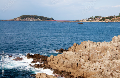 Tojinbo cliffs with blue sky on sunny day. Fukui, Japan photo