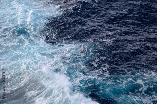 sea waves behind the ship