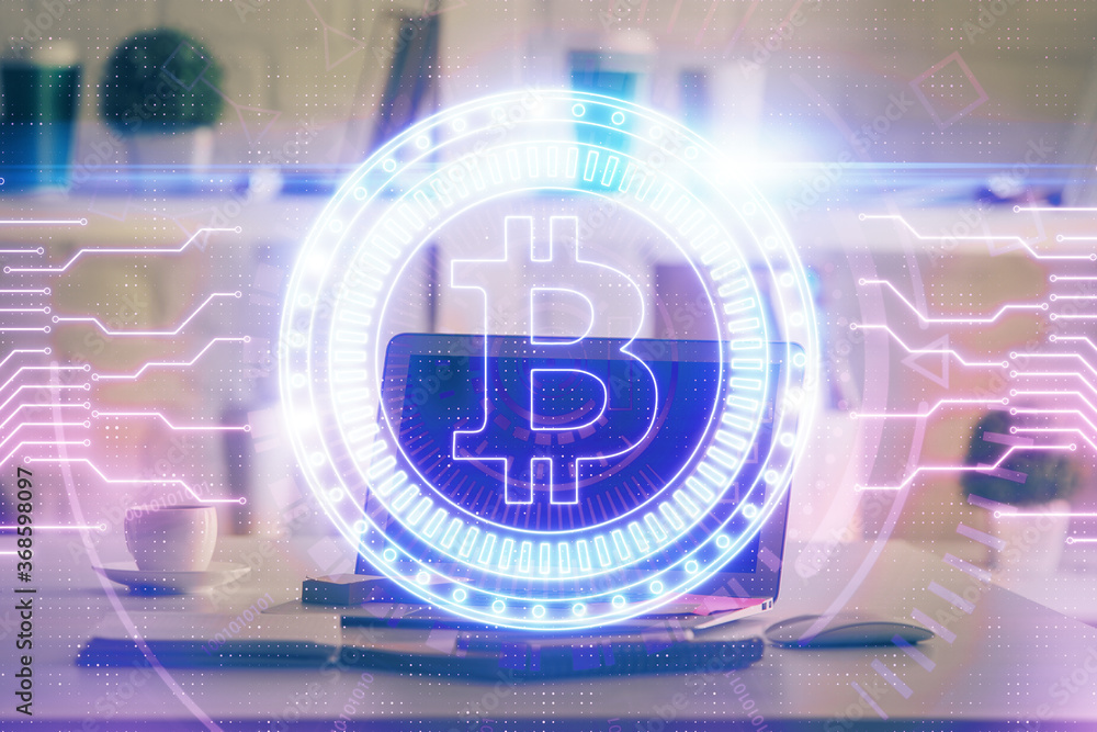Multi exposure of blockchain theme hologram and table with computer background. Concept of bitcoin crypto currency. Multi exposure of blockchain theme hologram and table with computer background. Concept of bitcoin crypto currency.