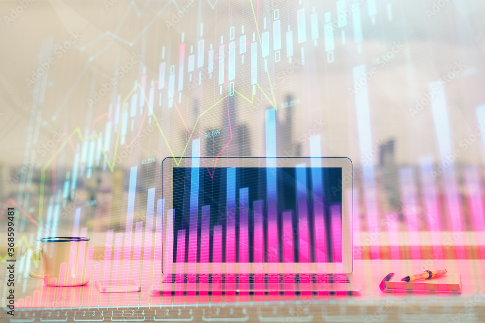 Forex market chart hologram and personal computer background. Double exposure. Concept of investment. Forex market chart hologram and personal computer background. Double exposure. Concept of investment.
