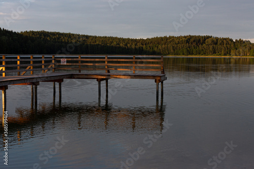 Wooden footbridge in the lake