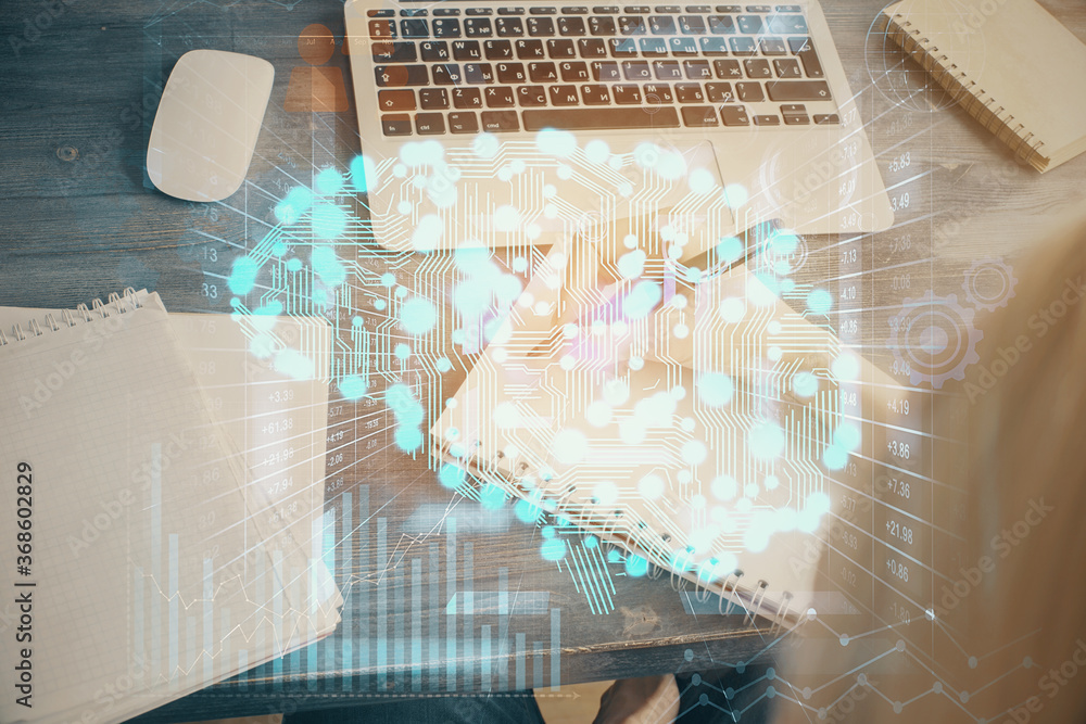Multi exposure of writing hand on background with brain hologram. Concept of learning. Multi exposure of writing hand on background with brain hologram. Concept of learning.